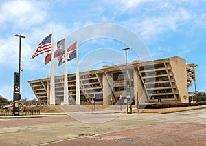 Dallas City Hall with American, Texas, and Dallas Flags in front