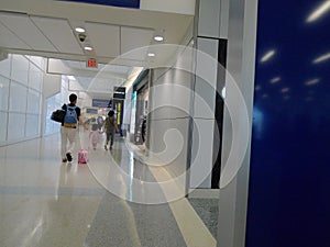 Dallas Fort Worth Airport, customers near shops inside terminal