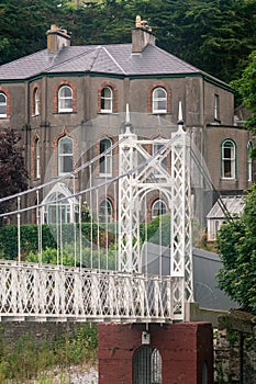 Daly`s Bridge Shakey Bridge for pedestrian on river Lee in Cork photo