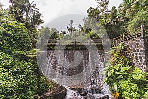 Dam at Abandon Bano Grande Swim area in El Yunque National Forest, Puerto Rico photo