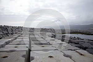 Dam concrete blocks in port of Lajes do Pico, Azores photo