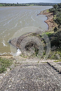 Dam of Cornalvo Reservoir from top of the wall, Extremadura, Spa