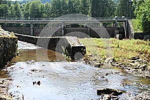 Dam Hradiste with regulated riverbed of river Cerna - Black photo