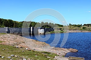 Dam at northern end Loch Doon, Carrick, Scotland photo