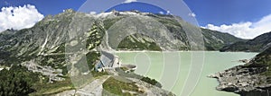 Dam and the reservoir on the way to Grimselpass