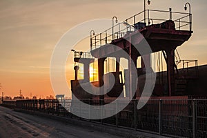 Dam on the river at sunset