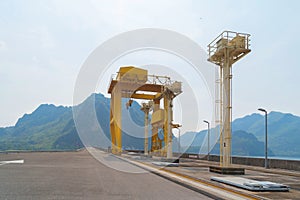 Dam tower crane. Reservoir and sea water in recycle energy industry concept for electricity in Natural landscape background.