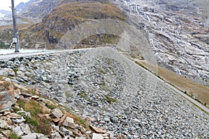 Dam wall of reservoir Mattmark lake near Saas-Fee, Pennine Alps, Switzerland