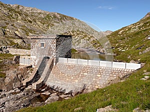 Dam, water reflection and sky