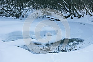 Dam in winter frozen river