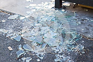 Shards of broken glass on floor photo