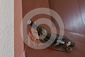 Damage of the door bolt after housebreaker by a thief photo