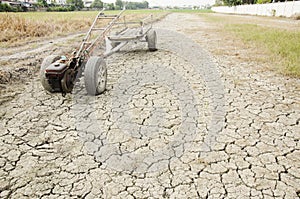 Damage old Tractor and Trailer towing stop on Paddy field wait s