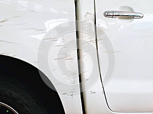 Damage and Scratched with white car