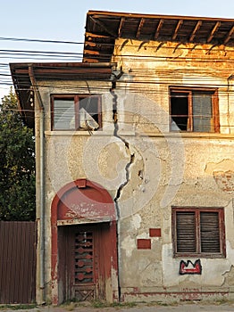 Damaged abandoned building almost collapsing