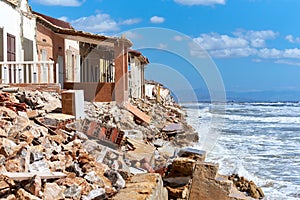 Damaged beach houses. Spain