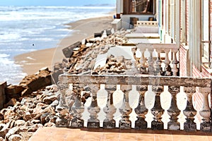 Damaged beach houses. Spain