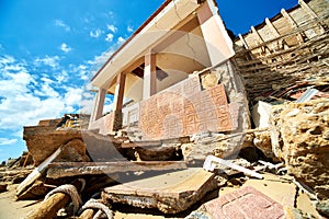 Damaged beach houses. Spain