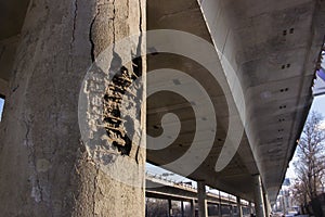 Damaged bridge support close-up transportatin concrete