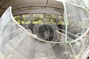 Damaged bus through broken window