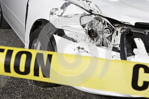 Damaged Car Behind Warning Tape