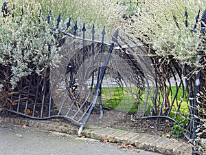 Damaged car crash fence