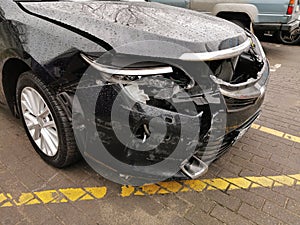 Damaged Car with Dents from the Accident, Car after an Head on Collision
