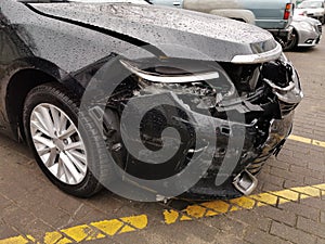 Damaged Car with Dents from the Accident, Car after an Head on Collision