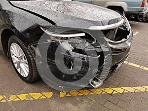 Damaged Car with Dents from the Accident, Car after an Head on Collision photo