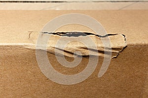 Damaged cardboard box. cargo insurance concept