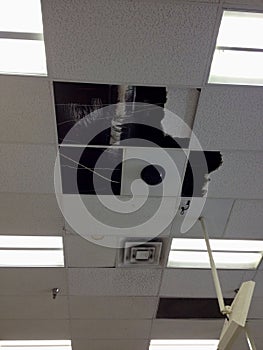 Damaged Ceiling Tiles in Commercial Building After Rain