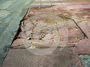 Damaged cements footpath.