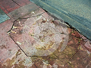 Damaged cements footpath.