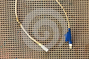 Damaged charging cable fixed with blue tape, repair and technology problem concept