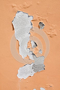 Damaged colored plaster - concept image useful image also to express the concepts of: aging, decadence, aging of human skin and so