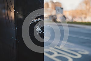 Damaged, Cracked glass of the bus stop at Shepherd`s Bush, London photo