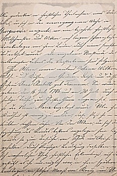 Distressed antique hand written letter on sepia paper photo