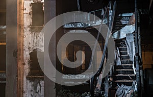 Damaged escalator in abandoned shopping mall building