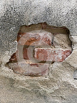 Damaged Exposed Red Brick Wall in Europe