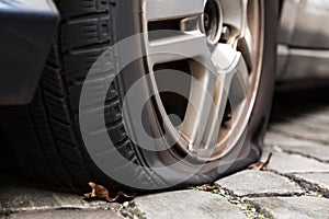 Damaged Flat Tire Of A Car