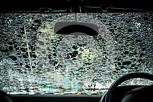 Damaged glass (car windshield) inside car