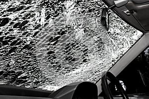 Damaged glass (car windshield) inside car