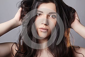 Damaged Hair. Model Holding Messy Unbrushed Dry Hair In Hands. Health And Beauty. girl with brown hair