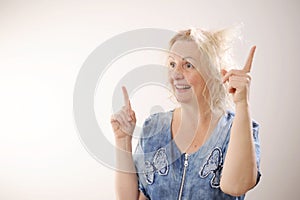 Damaged Hair. Sad adult Woman With Disheveled Hair. Closeup Portrait Of Female Model Holding Unbrushed Dry Hair In Hands