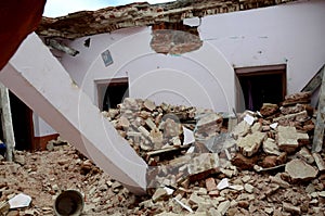 DAMAGED HOUSE