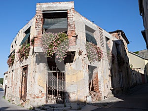 Damaged house in the center of Vukovar, Croatia with bullet impacts.