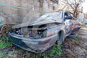 Damaged and looted cars in a city in Ukraine during the war