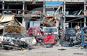 damaged and looted cars in a city in Ukraine during the war