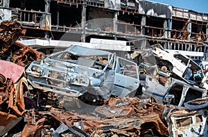 damaged and looted cars in a city in Ukraine during the war