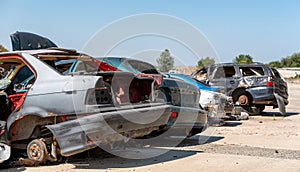 damaged and looted cars in a city in Ukraine during the war